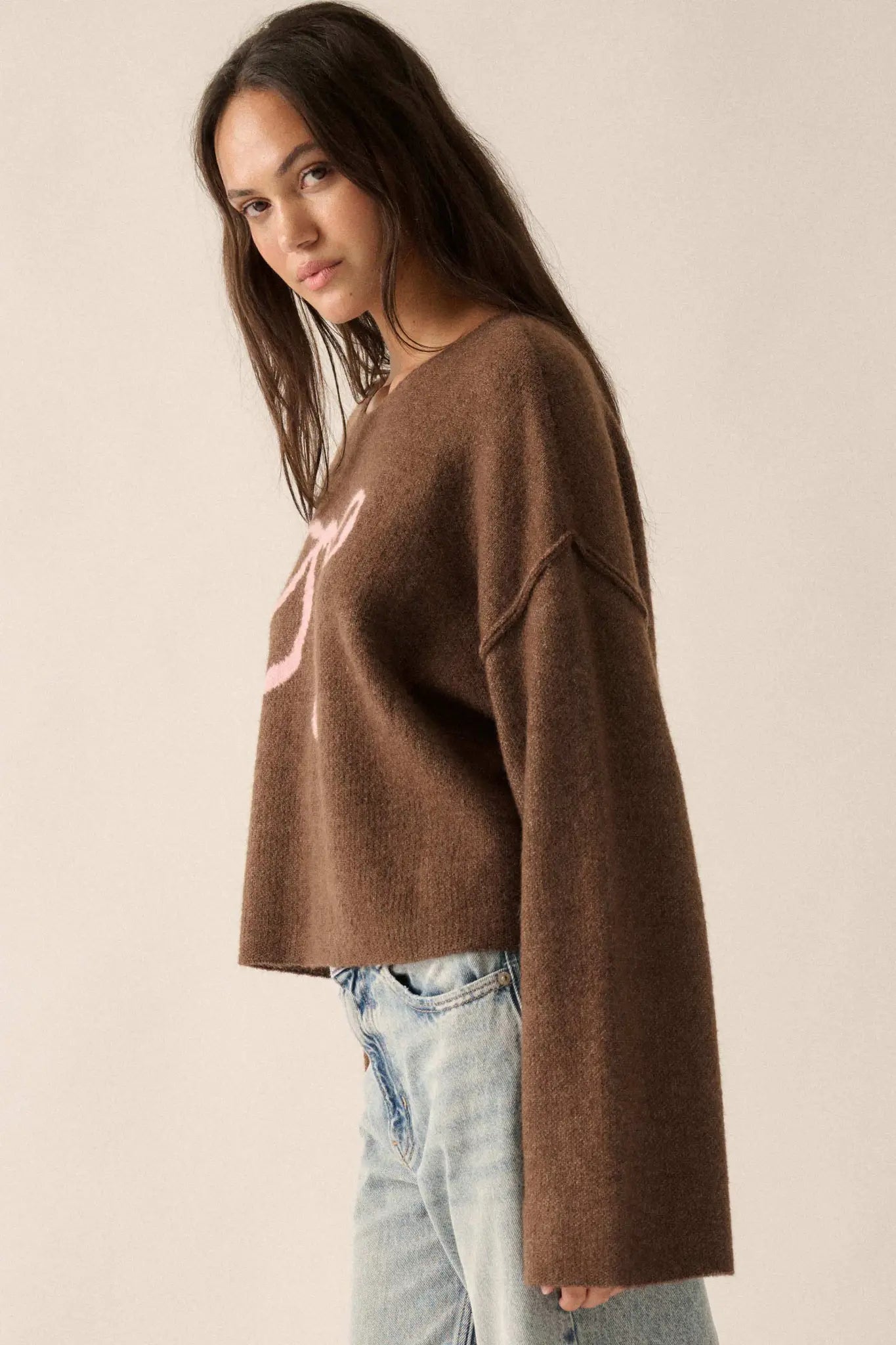 Let It Bow Exposed-Seam Bow Jacquard Knit Sweater