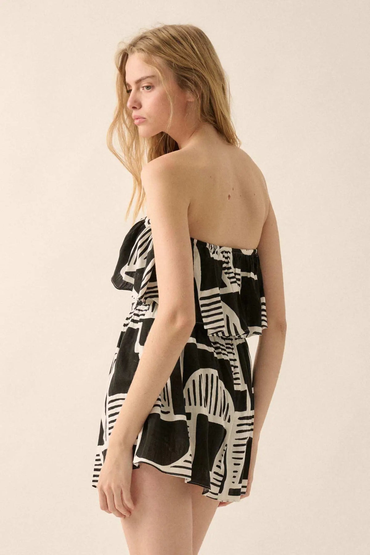 Shape of You Geo-Print Strapless Flounce Romper